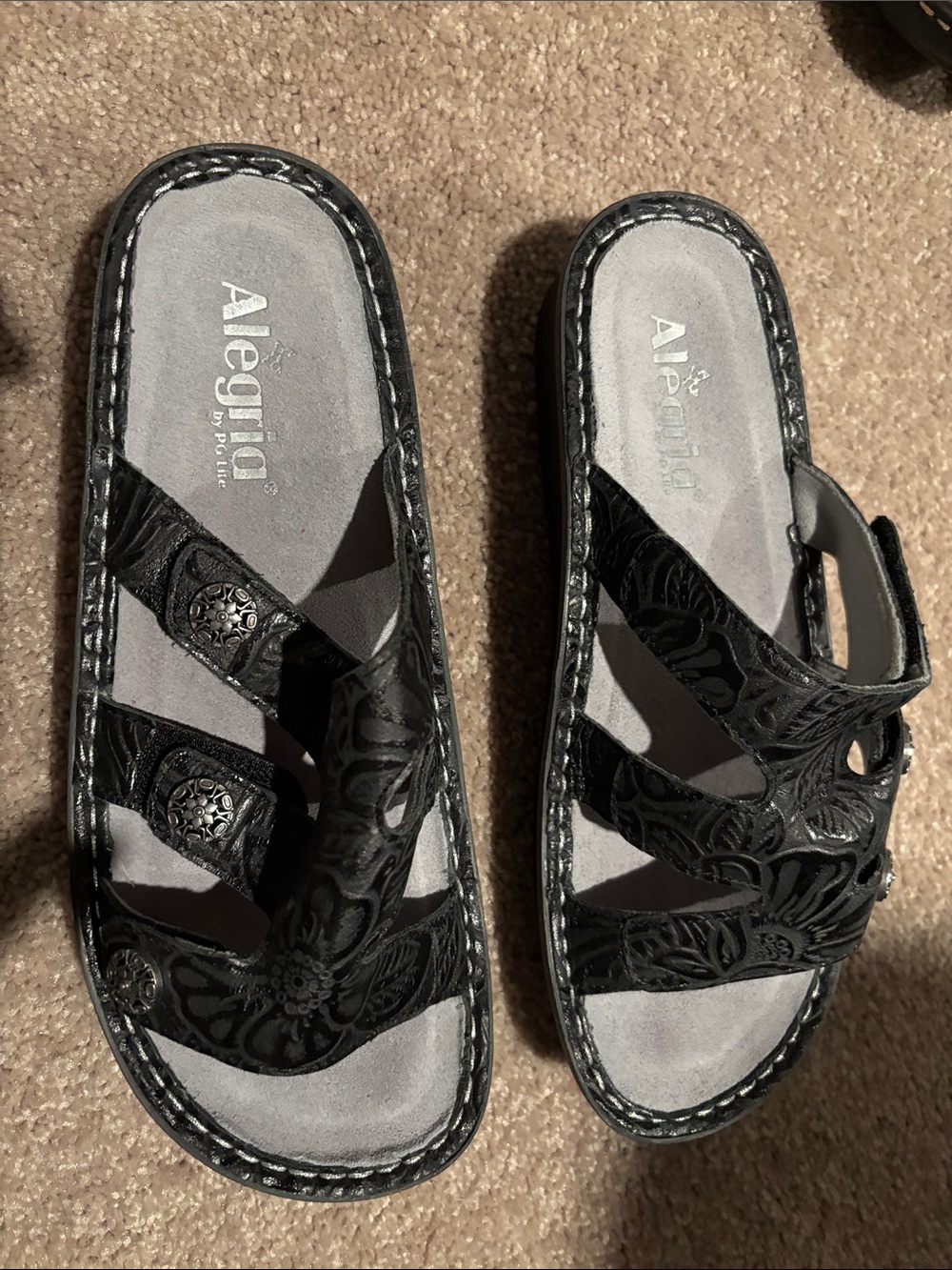 Alegria Black Floral-Embossed Leather Slide Sandals